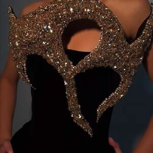 Elegant Black Dress with Gold Embellishments